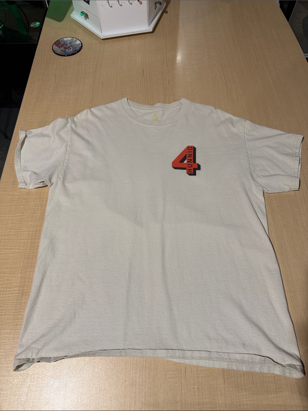 Cream Short Sleeve Graphic Tee with Red '4' Accent